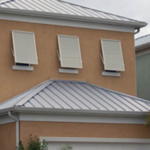 Bahama shutters on multiple windows