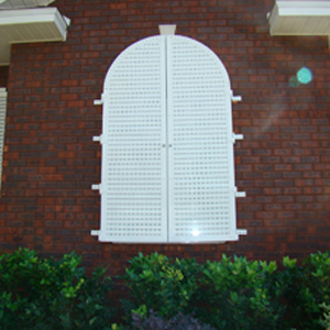 Colonial shutters on multiple windows